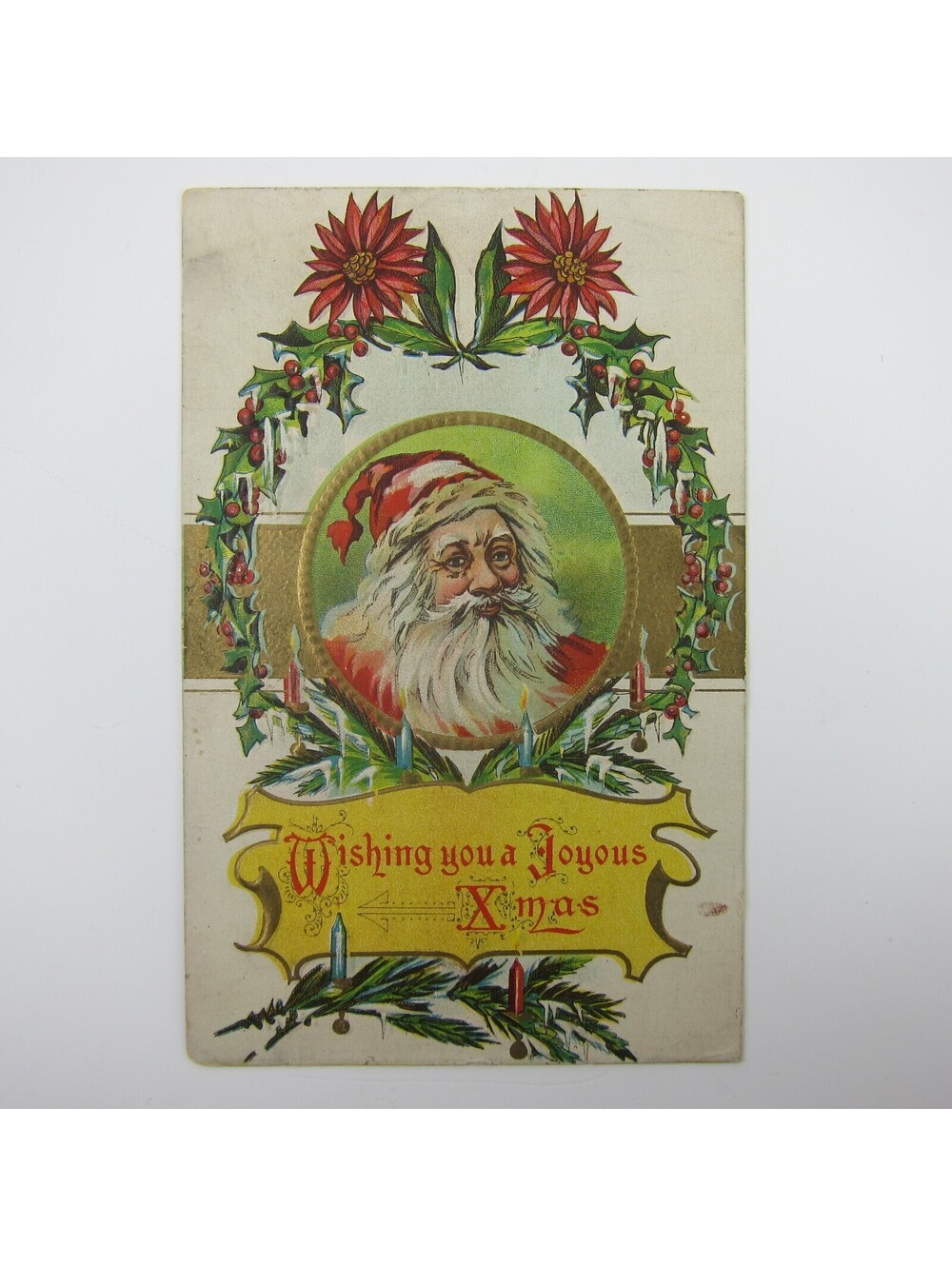 Antique Christmas Postcard Santa Poinsettia Holly Wreath Candles Gold Embossed